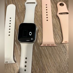 Apple Watch Series 5 with extra bands and air pods